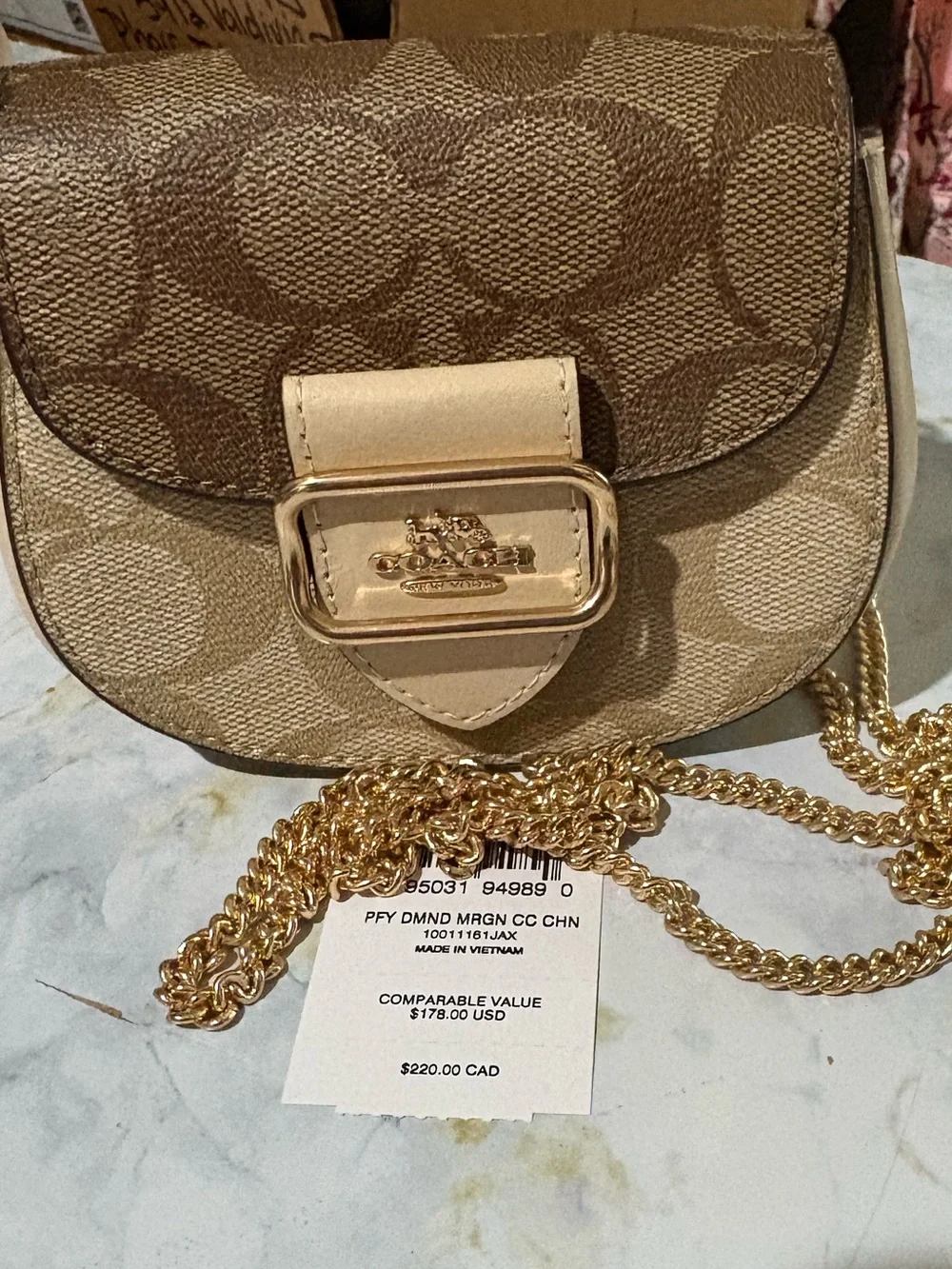 Coach Signature Canvas Saddle Crossbody in Tan and Cream with Gold Hardware